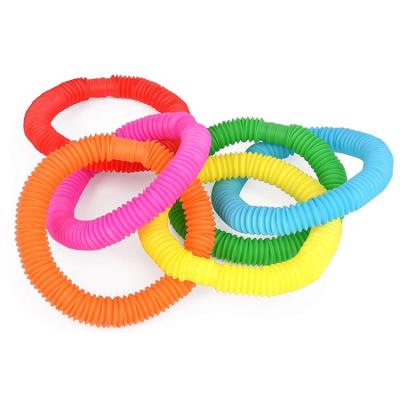 China DIY Fun Pull Plastic Tubes Whistle Bunmo Tube Relaxing Toys Busy Person Toys For Kids for sale