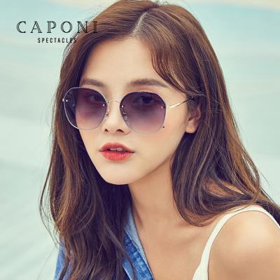 China Fashion Classic Sunglasses CAPONI 2022 Fashion Gradient Lady Vintage Metal Frame Lens Nylon Round Polygons Bling Shades Women Rimless Sunglasses for sale