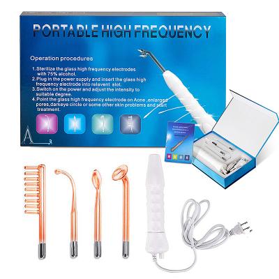 China Anti-puffiness 4 in 1 Facial Wand Therapy Skin Therapy Wand High Frequency Beauty Magic Wand Small Wands for sale