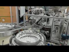 Desiccant cap filling and assembling machine