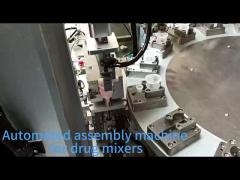 Automated assembly machine for drug mixers