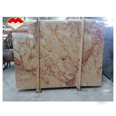 China 132.8 Mpa New Arrival Goose Feather Phoenix Golden Marble For Interior Wall Floor Tiles for sale