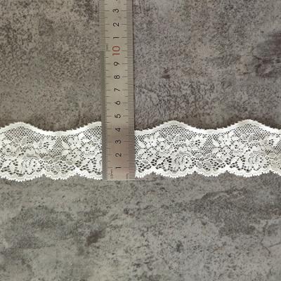 China Luxury Elegant Elasticity Lace Knitting Fabrics 3D Lace Fabric For Wedding Fabric Roll Sewing White Lace for sale