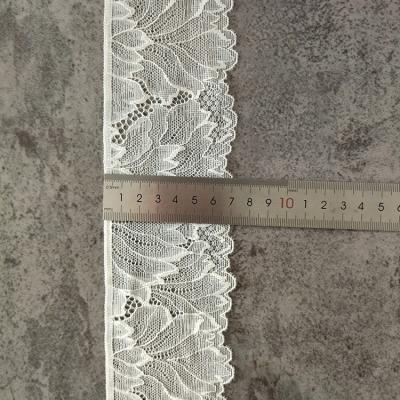 China High Quality Beaded Elasticity Lace Fabric Dress Making Fabric Custom Nylon Lace Flower Knitting Lace Fabric for sale