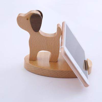 China Free Sample 2019 New Design Desktop Cell Phone Durable Cute Logo Wooden Cell Phone Stand for sale