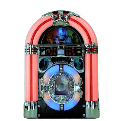 China Home/Outdoor/Bar/Family Classic 7-color Coin Operated Mini JSY Usb/sd Am/fm Aux Led Light Desktop Jukebox for sale