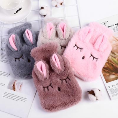 Cina Cute PVC Stress Pain Relief Therapy Bag with Knitted Soft Cozy Cover Winter Warm Hand Warmer hot water bottle rubber in vendita