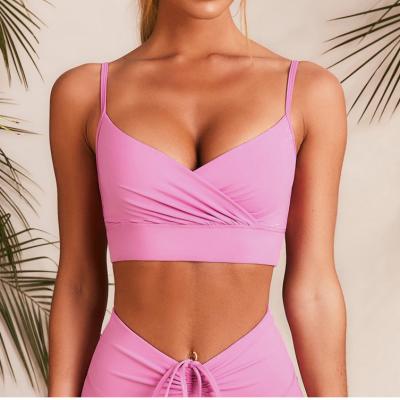 China Summer 2021 Breathable Fashionable Active Backless Crop Top Sports Bra And Leggings Set for sale