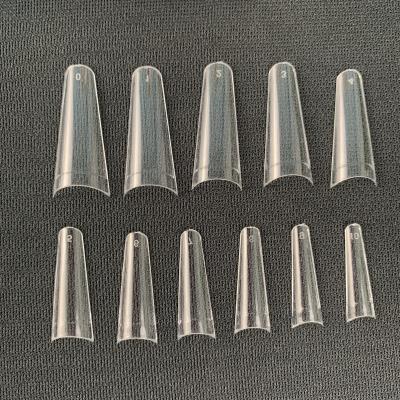 China Easy Apply.popular 550PCS In Bag Seamless Clear Artificial Nails Half Cover No C Curve Short Tapered Coffin Nail Tips for sale