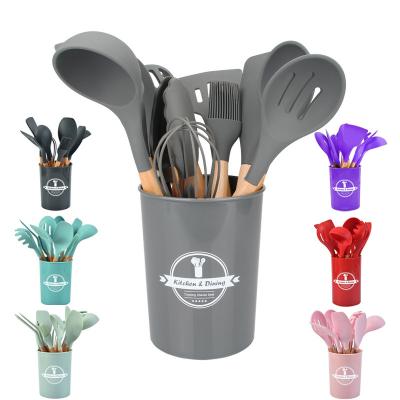 China Sustainable Silicone Kitchen Accessories Cooking Tools Kitchenware Silicone Kitchen Utensils With Wooden Handles for sale