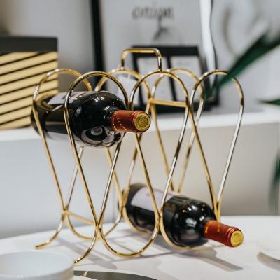 China Other Circle Design Portable Wine Rack 5 Bottles Metal Wine Rack With Handle Desktop Wine Rack for sale