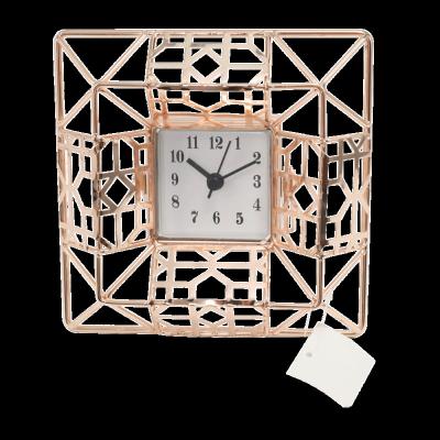 China Wholesale Hollow Clock Hot Selling Art Decor Metal Table Quartz Clock Home Decoration Clock for sale