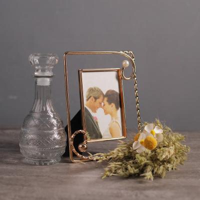 China Retro Decorative Nordic Creative Photo Frame Metal Frame Photo Display Frame Gold Glass Desk Frame For Picture for sale