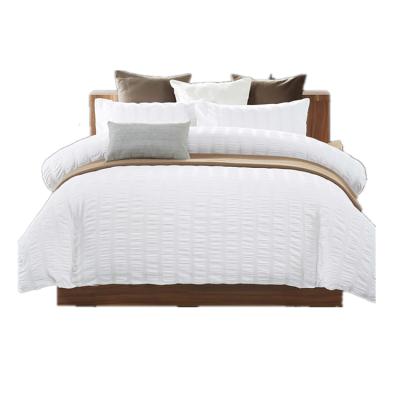 China Hot Sales Nondisposable Organic Cotton Sheets 100% Cotton Seersucker Luxury Bedding Set Sheet Set for sale