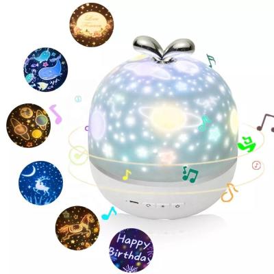 China Moon and Star Rechargeable Night Rotating Element Music Box LED Light Projector 360 Degree Rotating Romantic Projector with Music Box for sale