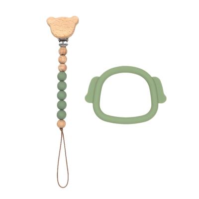 China Soft Cute Toy Silicone Dog Shape Silicone Pacifier Pacifier Clip Chain Beech Wood Pacifier Clip Chain For Baby for sale