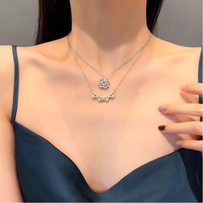 China New Design Cute Four Leaf Clover Heart Magnetic Pendant Necklace For Women Girls Fashion Zircon Christmas Gift Titanium Steel Jewelry for sale