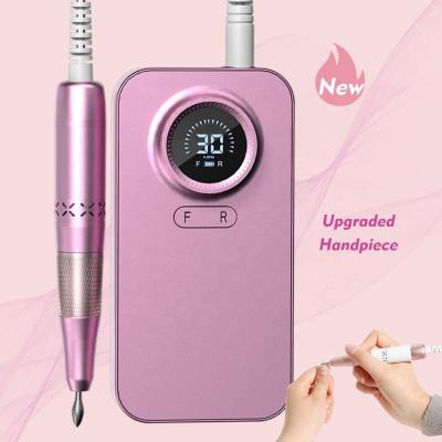 China Quickly Remove Wholesale Portable Electric Nail Drill Machine Set Manicure Polishing Cordless Professional Nail Drill for sale