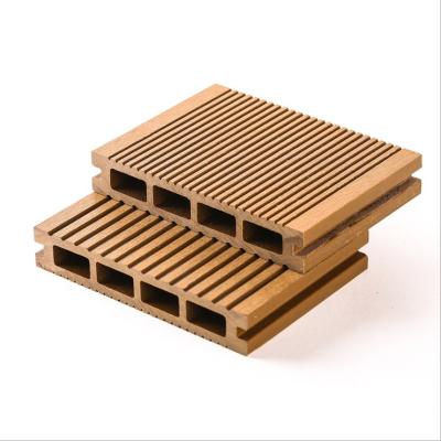 China 2021 new environmentally friendly wooden wpc house decking floor plastic outdoor boat deck flooring materials for sale