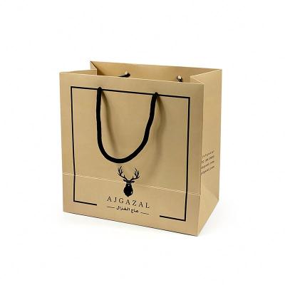 China Custom Packing Box Logo Matte Laminated Kraft Paper Bag Grosgrain Ribbon Handle Bags Packaging for sale