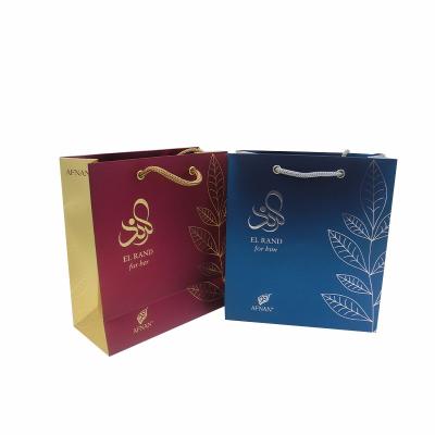 China OEM Recyclable Luxury Hotsale Logo Grocery Custom Printing Paper Bag OEM Silver Or Gold Paper Bag for sale