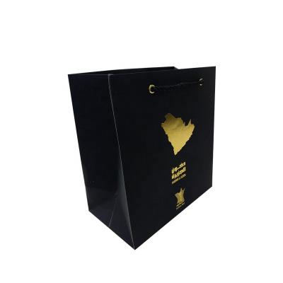 China Recyclable Reliable Quality Black Luxury Paper Shopping Bag With Handle And Grommet For Gift Apparel Packaging for sale