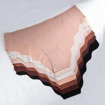 China New Design Antibacterial Ice Silk Girls Briefs 7 Colors Wave Bikini One Piece Seamless Panties Solid Mid Edge Waist for sale