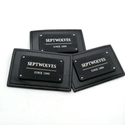 China FREE SAMPLE Metal PU Label Washable Metal Badge Black Leather Letters Pattern For Handbag Leather Clothing for sale