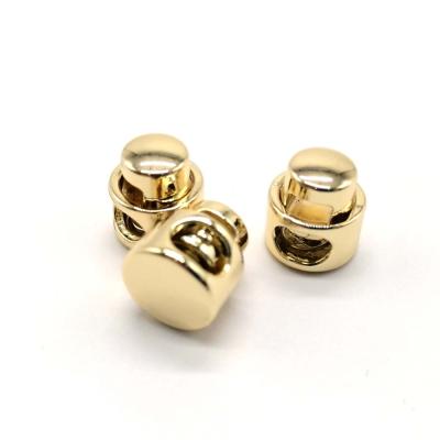 China Custom goldtone nickel free metal stopper for clothing high quality rubber stopper for jacket for sale