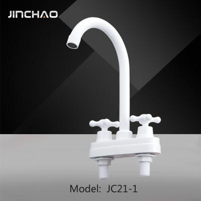 China Modern Multifunctional Plastic Water Faucet Dual Handle Cold And Hot Water Faucet Mixer Kitchen Sink Faucet for sale