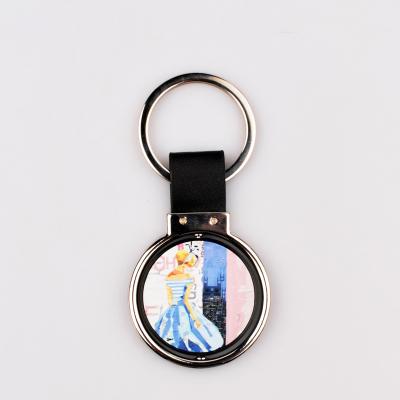 China Low Promotion Gift Key Chain Price Ready To Ship Blank Circle Shape Sublimation Metal Rotating Key Chain for sale