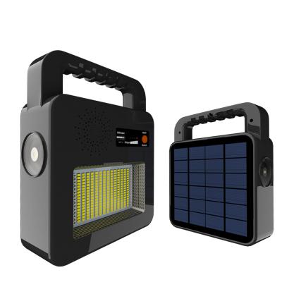 China Bluetooth Speaker Outdoor Tent Garden Flashlight Camping LED Solar Rising Lanterns For Lighting for sale