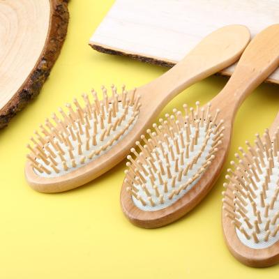 China Cushion Factory Airbag Home and Wholesale Salon Use Paint All Type Wood Detangling Massage Brush Detangling Hair Brush for sale