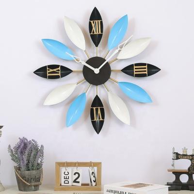 China Leaf Modern Simple Creative Quiet Decor Iron Art Clock Nordic Decorative Living Room Wall Clock for sale