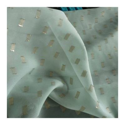 China 100%Polyester Anti-Static Attractive Gold Shine / Gold Glitter Tulle Silver Tulle Dress Fabric for sale