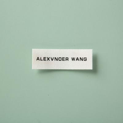 China 2021 Fashion Design Apparel Taggs Woven Label Sustainable Textile Label Logo And Tag for sale