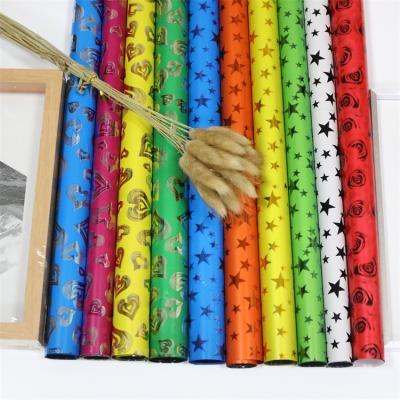 China Custom Logo Waterproof Cellophane Laser Cellophane Tissue Paper Gift Wrapping Sheets Custom Logo Rainbow Colors Customized for sale