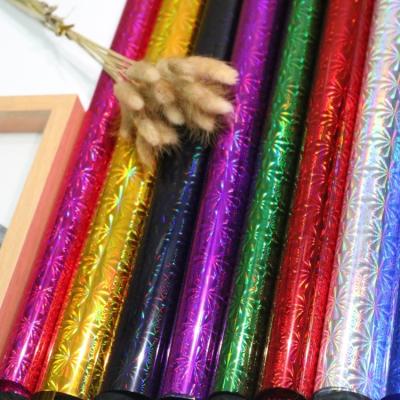 China Hot Sale Customized Moisture Proof Cellophane Clear Wrapping Film Laser Christmas Gift Wrap Rainbow Colors for sale