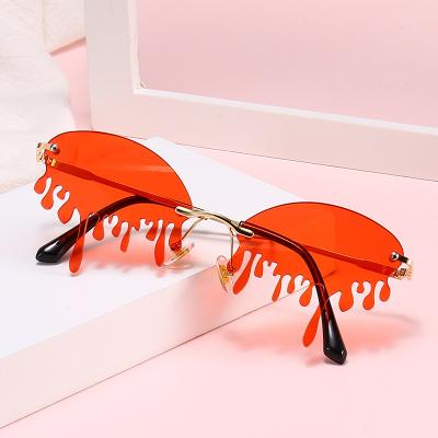 China 2021 Luxury Promotional Teardrop Sunglasses Low MOQ Fashion Glass Rimless Cool Frameless Cute Party Sun Glasses Uv400 for sale