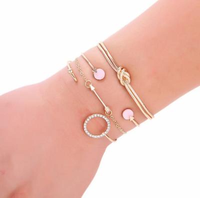 China Simple Concise Women's Hair Band Resin Round Alloy Arrowhead Bracelet Set With Four Pieces For Women's Jewelry Bracelet for sale