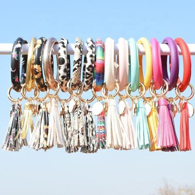 China Environmentally Friendly Leather Key Bracelet Christmas Key Chain Creative PU Tassel Pendant for sale