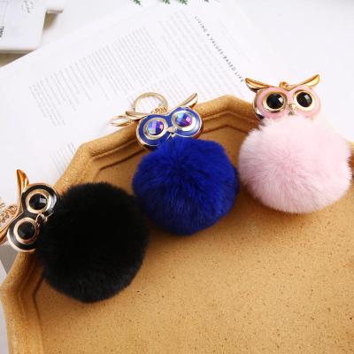 China 2022 New Promotion Souvenir Gifts Owl Pompom Fur Ball Rabbit Growing Key Chain Lady Hair Pendant Bag For Women for sale