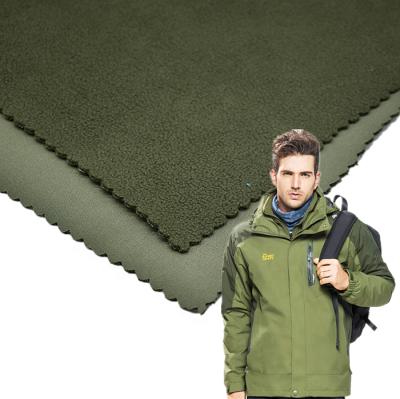 China 4 Way Waterproof Waterproof Stretch Softshell Fabric With Fleece Backing for sale