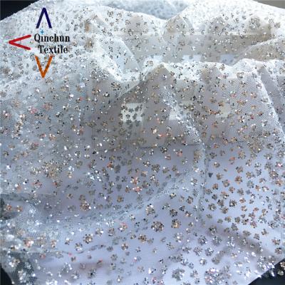 China Simple Tulle Fabric Glitter Sequin Fancy Fabric For Wedding Dress for sale