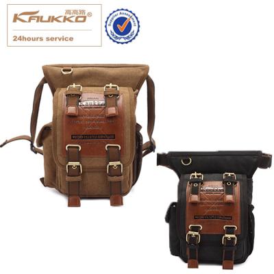 China Canvas KAUKKO Leather Motorcycle Waist Bag Canvas Men Vintage Messenger Bag for sale