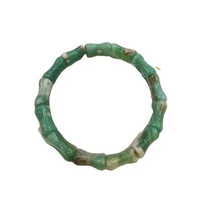 China China sales of natural polishing handcrafted green Sakura hand string bracelet ornaments for sale