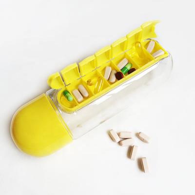 China Viable 2 in 1 Portable Medicine Organizer Water Bottle Outdoor 7 Compartments Pill Box with Drinking Bottle for sale