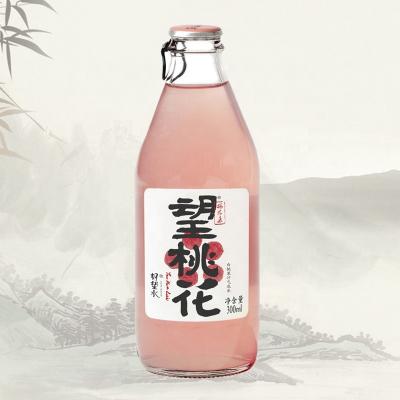 China Carbonate Juice 300ml 1*24 Bottle Peach Glitter Sparkling Soda for sale