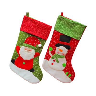 China Wholesale 2021 fashion cheap christmas decoration snowman pattern red and green price stockings for sale