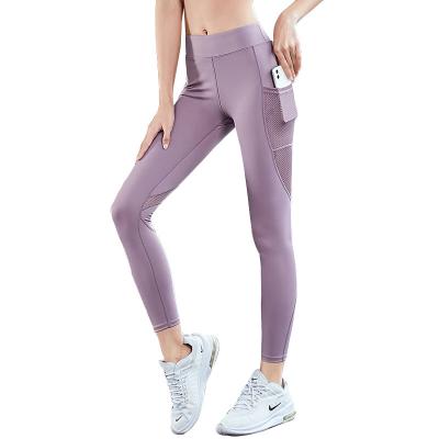 China Breathable Women 4 Way Stretch High Waist Yoga Pants With Mesh Pockets Workout Running Yoga Gaiters for sale